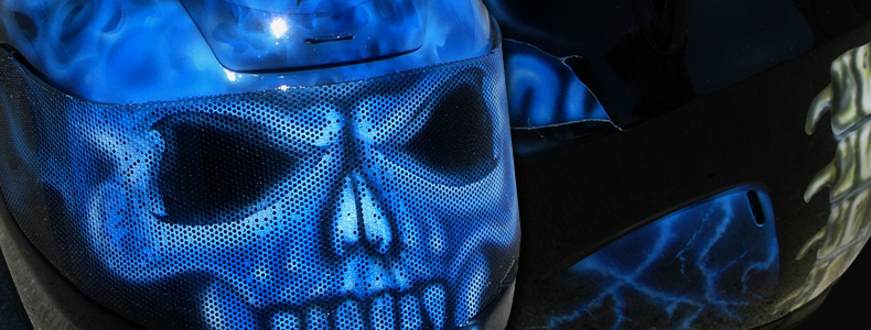 True fire blue skull full face motorcycle helmet with spine and brain exposed as well as airbushed visor.